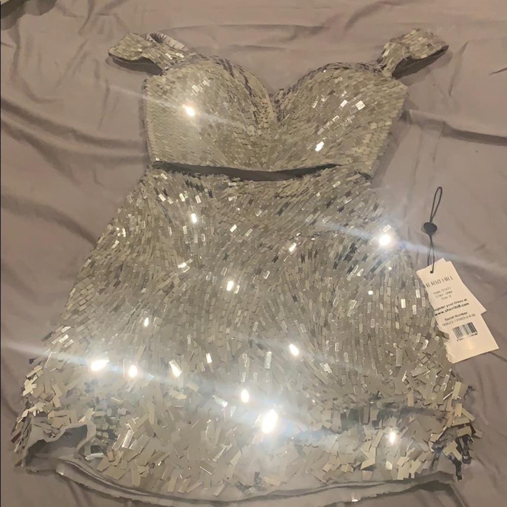 Show stopping two pics Sherri hill dress